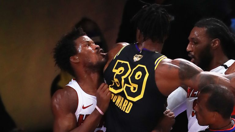 Jimmy Butler of the Miami Heat and Dwight Howard of the Los Angeles Lakers get into an altercation during the first quarter in Game Five of the 2020 NBA Finals