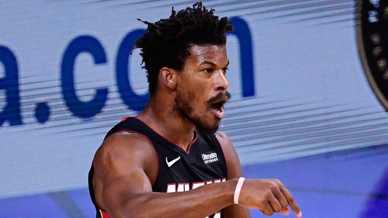 Jimmy Butler gestures after scoring in the Miami Heat's victory over the Los Angeles Lakers in Game 3 of the NBA Finals