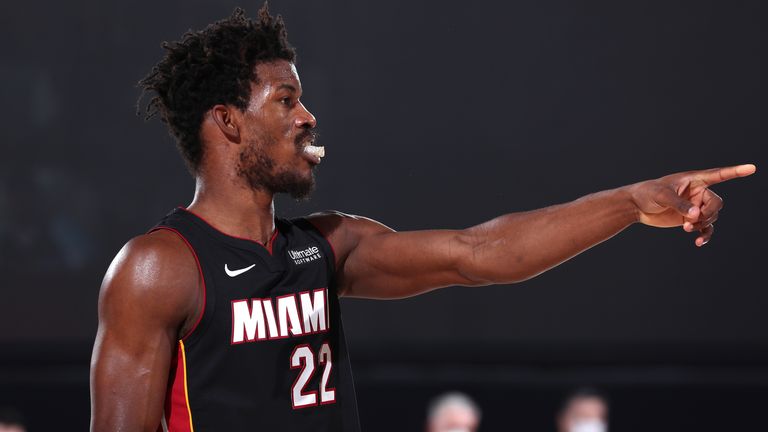 Jimmy Butler offers positional advice to a Heat team-mate during Game 4 of the NBA Finals