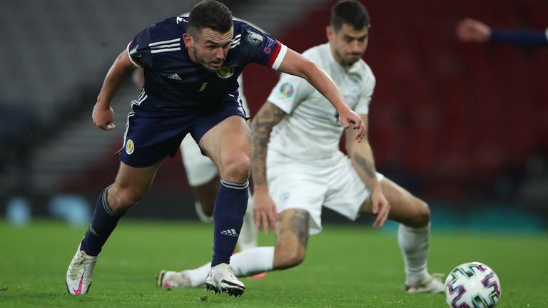 Scotland;s John McGinn battles for the ball in the Euro 2020 play-off semi-final against Israel
