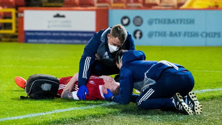 Jonny Hayes was treated for an early head injury and later was forced off