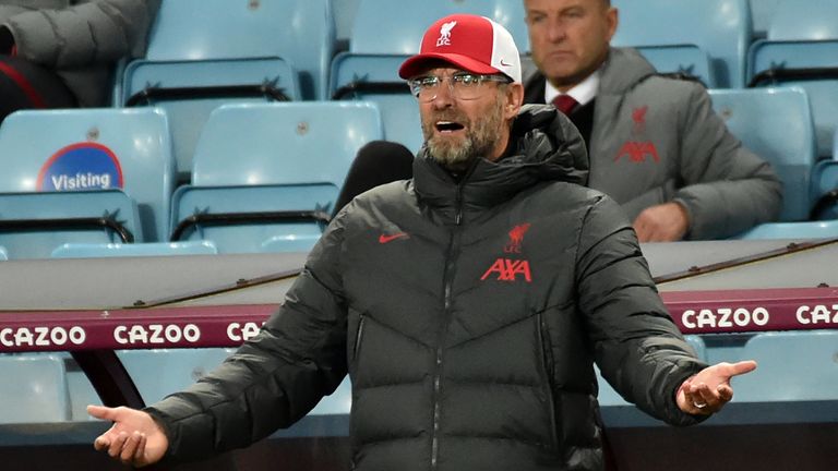 Jurgen Klopp gestures on from his technical area at Villa Park