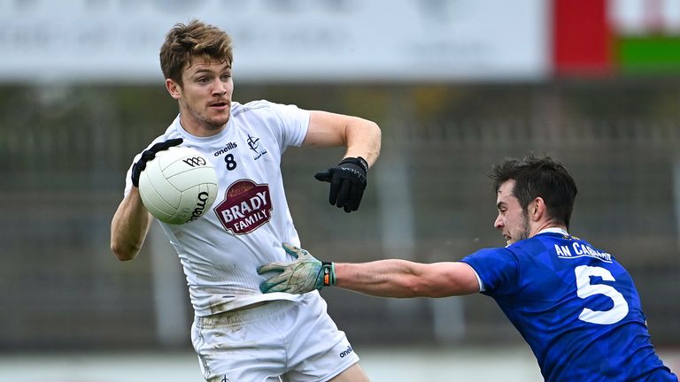 Kevin Feely of Kildare in action against Gerard Smith of Cavan
