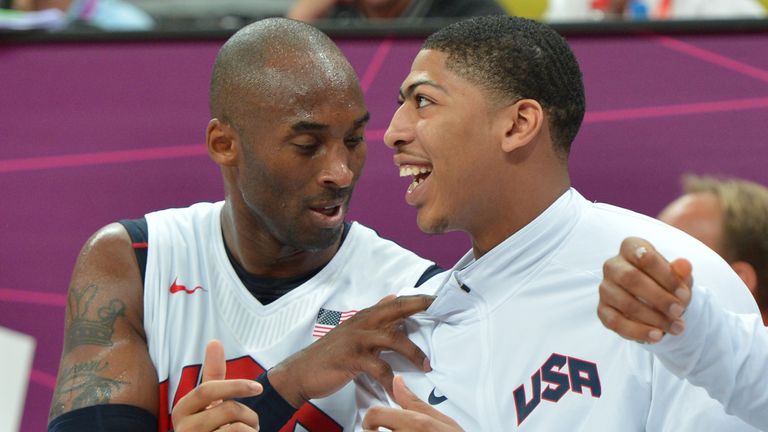Kobe Bryant and Anthony Davis chat on the Team USA bench during the 2012 Olympics in London