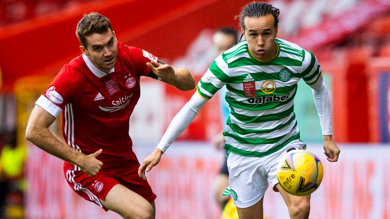 Celtic's Diego Laxalt and Tommie Hoban in action during a Scottish Premiership match between Aberdeen and Celtic at Pittodrie Stadium
