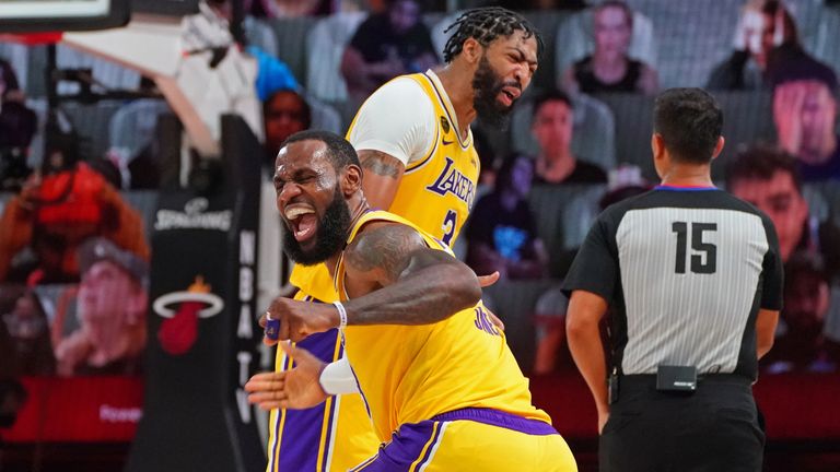 LeBron James and Anthony Davis celebrate the Los Angeles Lakers&#39; Game 4 win over the Miami Heat in the NBA Finals