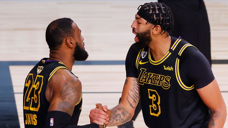 LeBron James and Anthony Davis encourage one another in Game 5 of the NBA Finals