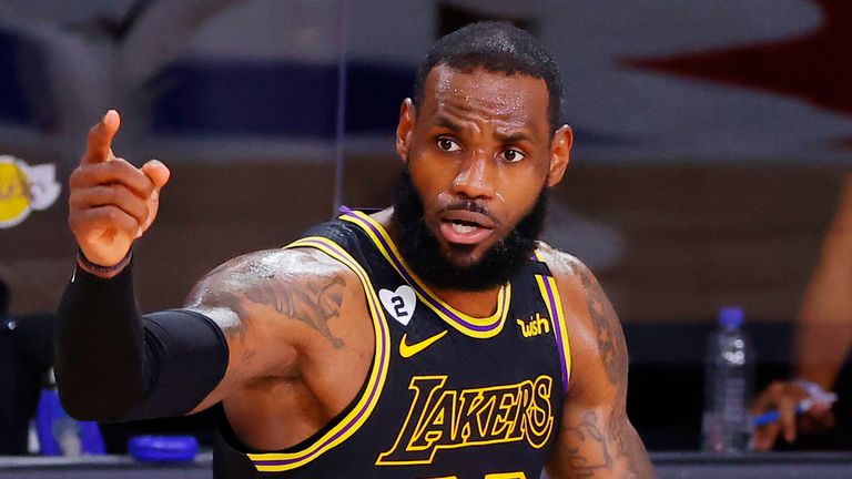 LeBron James signals to a team-mate during the Lakers&#39; Game 2 win over the Miami Heat