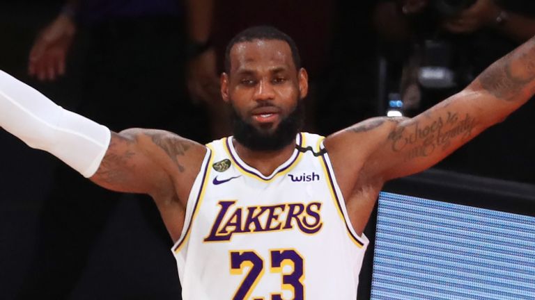 LeBron James celebrates after leading the Los Angeles Lakers to the NBA title