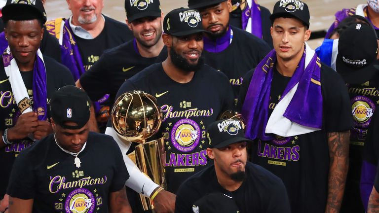 LeBron James and the Los Angeles Lakers celebrate with the Larry O&#39;Brien trophy