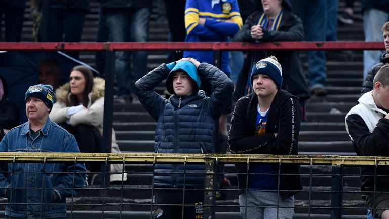 BRADFORD, ENGLAND - MAY 11: Fans of Leeds Rhinos stand dejected following the Coral Challenge Cup match between Bradford Bulls and Leeds Rhinos at Odsal Stadium on May 11, 2019 in Bradford, England. (Photo by George Wood/Getty Images)