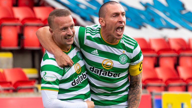 Leigh Griffiths celebrates with Scott Brown after giving Celtic a 1-0 lead late in the game