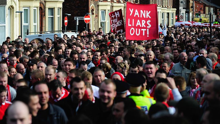 Liverpool fans marched in protest as Hicks and Gillett's ownership prior to the match against Manchester United in October 2009
