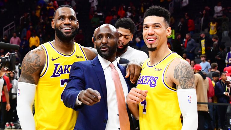 LeBron James #23 of the Los Angeles Lakers, Head Coach Lloyd Pierce of the Atlanta Hawks, and Danny Green #14 of the Los Angeles Lakers smile after a game on December 15, 2019 at State Farm Arena in Atlanta, Georgia.  NOTE TO USER: User expressly acknowledges and agrees that, by downloading and/or using this Photograph, user is consenting to the terms and conditions of the Getty Images License Agreement. Mandatory 