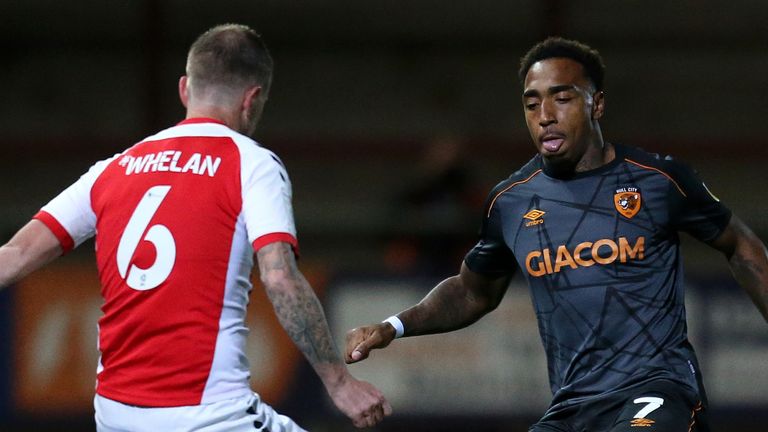 Mallik Wilks takes on Glenn Whelan during the League One fixture