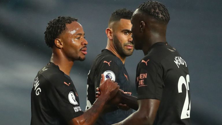 Sterling is congratulated by Benjamin Mendy after his third goal of the season