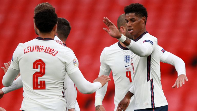 Marcus Rashford celebrates after scoring England's equaliser