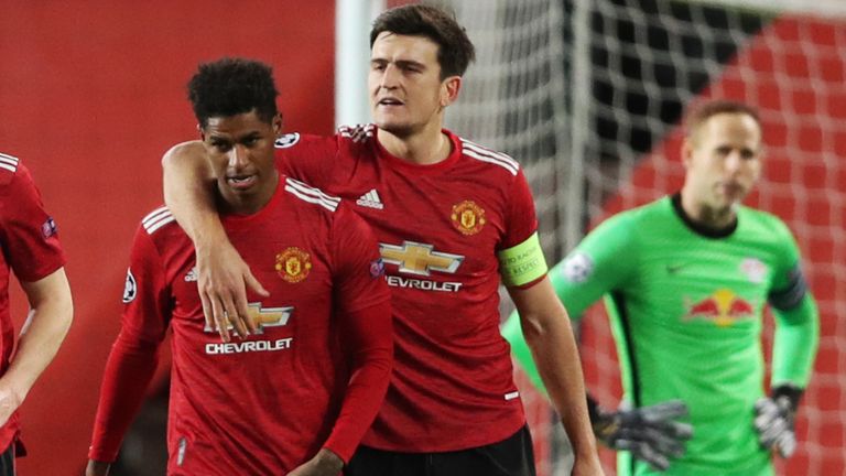 MANCHESTER, ENGLAND - OCTOBER 28: Marcus Rashford of Manchester United celebrates with his team mates after scoring his sides third goal during the UEFA Champions League Group H stage match between Manchester United and RB Leipzig at Old Trafford on October 28, 2020 in Manchester, England. 