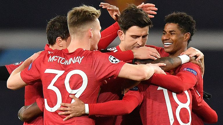 Manchester United&#39;s English striker Marcus Rashford (R) celebrates scoring his team&#39;s second goal during the UEFA Champions league group H football match between Manchester United and RB Leipzig at Old Trafford stadium in Manchester, north west England, on October 28, 2020. (Photo by Anthony Devlin / AFP) (Photo by ANTHONY DEVLIN/AFP via Getty Images)
