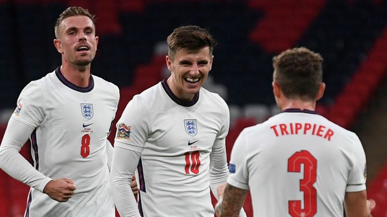 Mason Mount celebrates his winning goal against Belgium