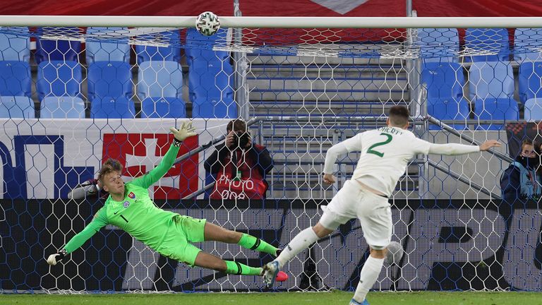 Matt Doherty hits the crossbar with his penalty as Slovakia progressed