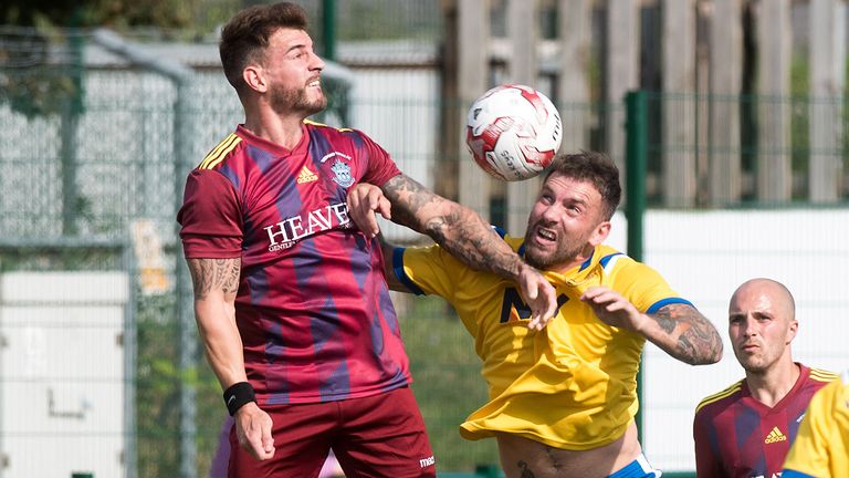 FOOTBALL: Newmarket v Thetford - Newmarket's Mark Lovell and Thetford's Matt Morton  (Picture by Mark Westley / Bury Free Press)