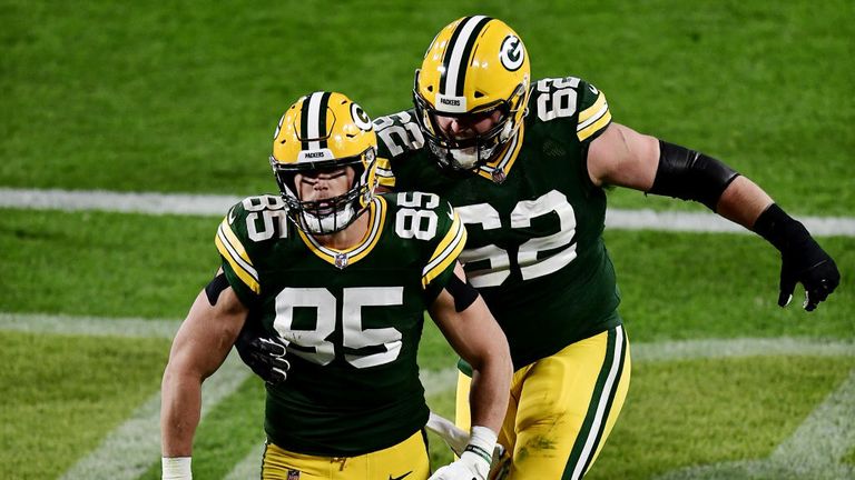 Robert Tonyan #85 of the Green Bay Packers celebrates with Lucas Patrick #62 after scoring a touchdown during the second quarter against the Atlanta Falcons at Lambeau Field on October 05, 2020 in Green Bay, Wisconsin. 