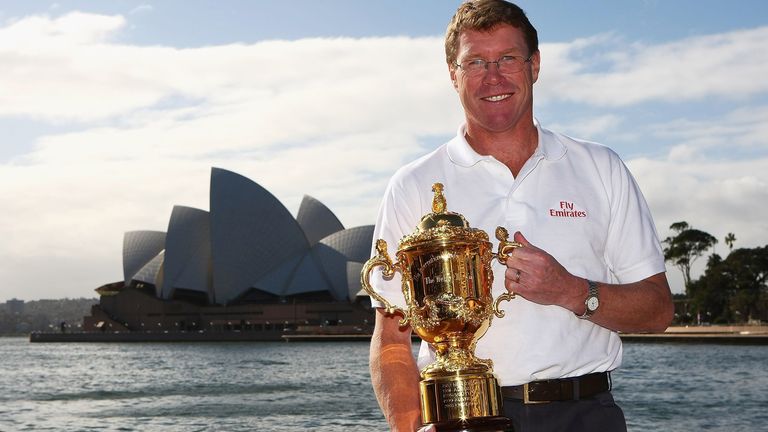 Former winning captain Nick Farr-Jones poses with the Rugby World Cup in Sydney