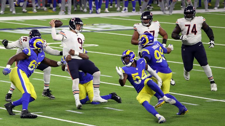 Nick Foles of the Chicago Bears is sacked by Justin Hollins of the Los Angeles Rams