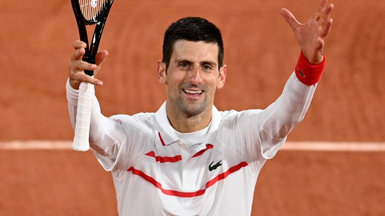 Serbia's Novak Djokovic celebrates after winning against Colombia's Daniel Elahi Galan at the end of their men's singles third round tennis match on Day 7 of The Roland Garros 2020 French Open tennis tournament in Paris on October 3, 2020