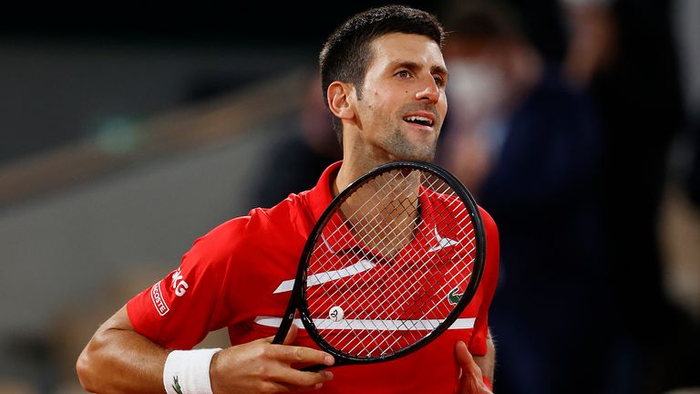 Novak Djokovic of Serbia celebrates after winning match point during his Men&#39;s Singles semifinals match against Stefanos Tsitsipas of Greece on day thirteen of the 2020 French Open at Roland Garros on October 09, 2020 in Paris, France