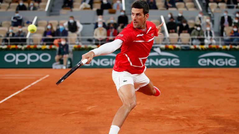 Novak Djokovic of Serbia plays a backhand during his Men's Singles Final against Rafael Nadal of Spain on day fifteen of the 2020 French Open at Roland Garros on October 11, 2020 in Paris, France