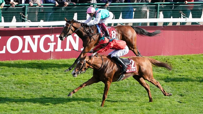 PARIS, FRANCE - OCTOBER 06: Pierre-Charles Boudot riding Waldgeist (red) win The Qatar Prix De L'Arc De Triomphe from Frankie Dettori and Enable (L) during Prix de l'Arc de Triomphe at ParisLongchamp Racecourse on October 06, 2019 in Paris, France. (Photo by Alan Crowhurst/Getty Images)