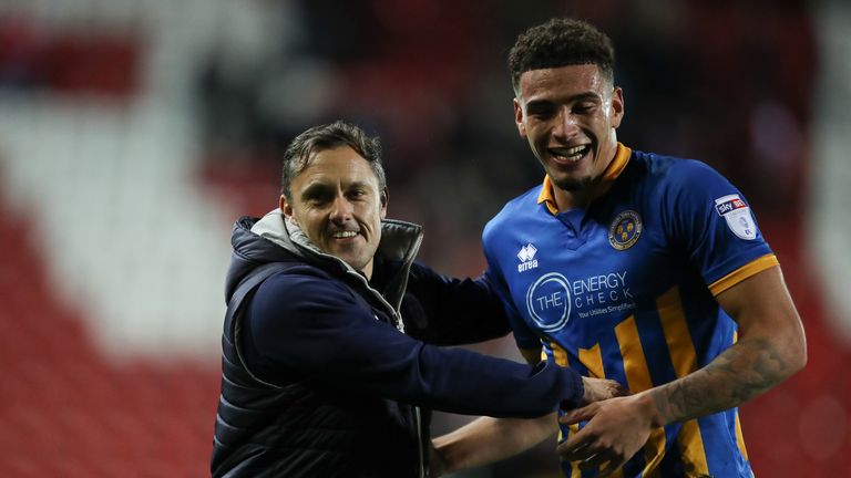 Paul Hurst and Ben Godfrey of Shrewsbury Town celebrate at full time during the Sky Bet League One match between Rotherham United and Shrewsbury Town at The New York Stadium on November 16, 2017