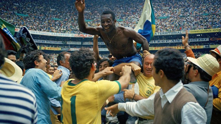 Pele is carried aloft after Brazil win the 1970 World Cup final against Italy in Mexico