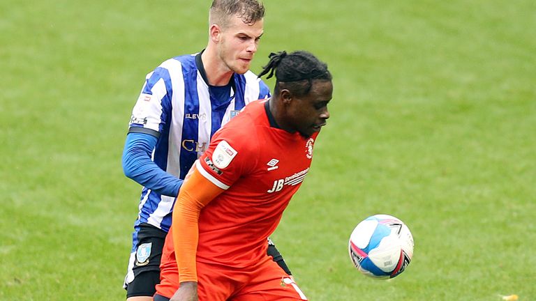 Luton goalscorer Pelly Ruddock in action