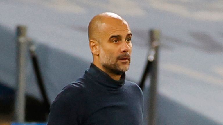 Pep Guardiola watches on during Manchester City&#39;s win against Porto in the Champions League