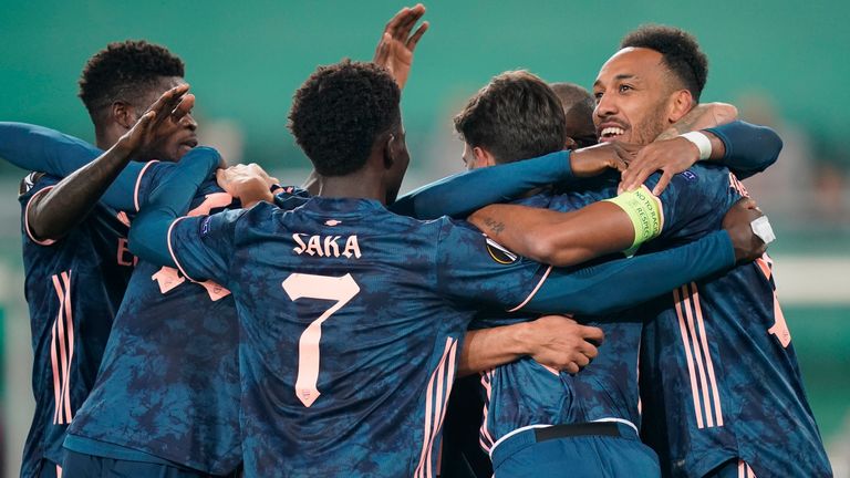 Arsenal players celebrate after Pierre-Emerick Aubameyang gave them the lead against Rapid Vienna