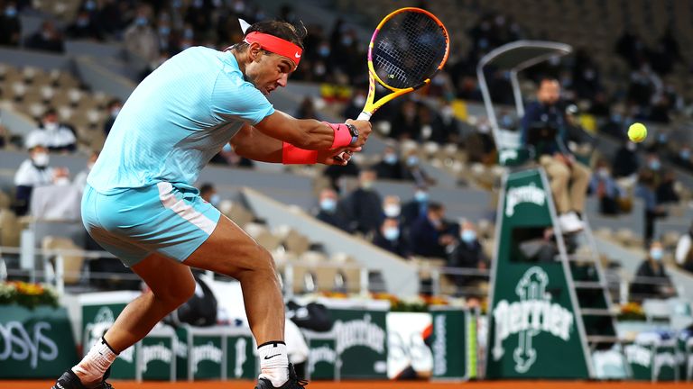Rafael Nadal of Spain plays a backhand during his Men's Singles Final against Novak Djokovic of Serbia on day fifteen of the 2020 French Open at Roland Garros on October 11, 2020 in Paris, France.