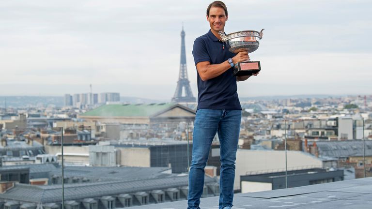Rafael Nadal of Spain poses on the roof of Les Galeries Lafayette with Les Mousquetaires trophy following his victory in the Men&#39;s Singles Finals against Novak Djokovic of Serbia on day fifteen of the 2020 French Open on October 12, 2020 in Paris, France. Rafael Nadal won his 13th trophy. 