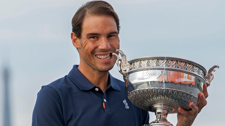 Rafael Nadal of Spain poses on the roof of Les Galeries Lafayette with Les Mousquetaires trophy following his victory in the Men&#39;s Singles Finals against Novak Djokovic of Serbia on day fifteen of the 2020 French Open on October 12, 2020 in Paris, France. Rafael Nadal won his 13th trophy. 