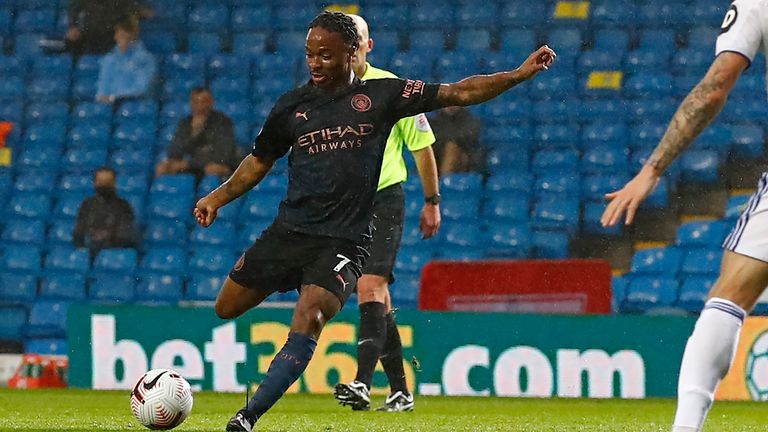 Sterling curls in the opening goal on 17 minutes for Man City against Leeds