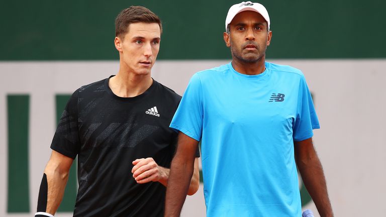 Rajeev Ram of The United States of America and Joe Salisbury of Great Britain play in their Men's Doubles third round match against Jeremy Chardy and Fabrice Martin of France on day seven of the 2020 French Open at Roland Garros on October 03, 2020 in Paris, France