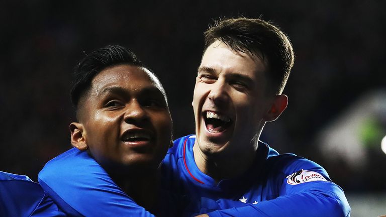 Alfredo Morelos of Rangers celebrates with Ryan Jack after scores his third goal during the Scottish Cup 5th Round Replay between Rangers and Kilmarnock at Ibrox Stadium on February 20, 2019 in Glasgow, Scotland