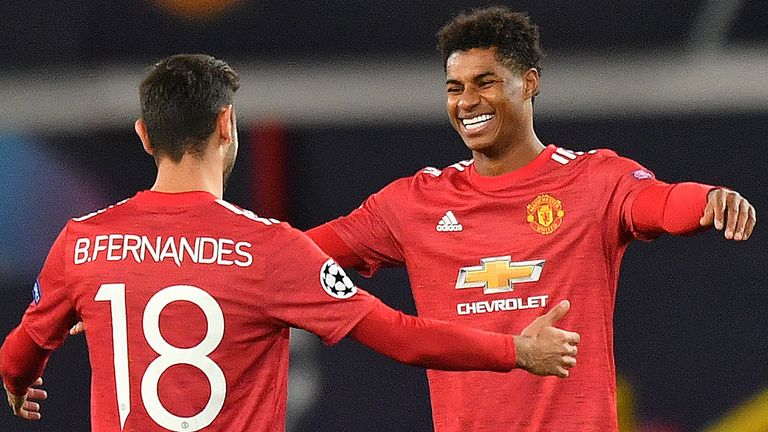 Marcus Rashford celebrates on his way to a hat-trick against RB Leipzig