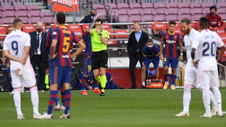 The referee pointed to the spot after checking the pitch side screen