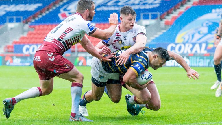 Picture by Allan McKenzie/SWpix.com - 03/10/2020 - Rugby League - Coral Challenge Cup Semi Final - Leeds Rhinos v Wigan Warriors - The Totally Wicked Stadium, Langtree Park, St Helens, England - Leeds's Rhys Martin scores a try against Wigan.