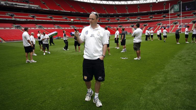 PICTURE by Ben Duffy/SWPIX.COM - Carnegie Challenge Cup final Wembley walk around, Hull FC...29/08/08..Copyright - Simon Wilkinson - 07811267706 ..Hull's coach Richard Agar takes a picture of Wembley stadium