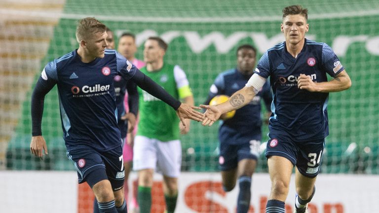 Ross Callachan (R) celebrates his goal