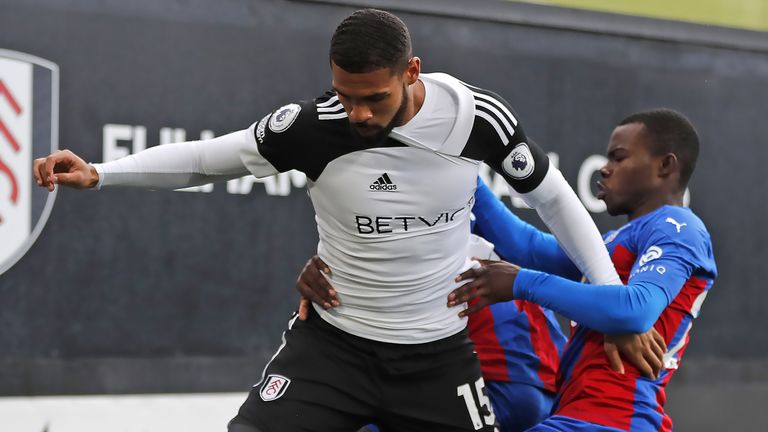 Fulham's Ruben Loftus-Cheek (left) and Crystal Palace's Tyrick Mitchell battle for the ball